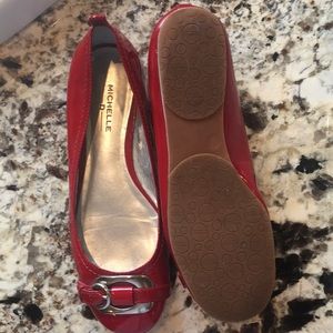 Red shoes Michelle D. Inside is flaking off but still have a lot of wear left.